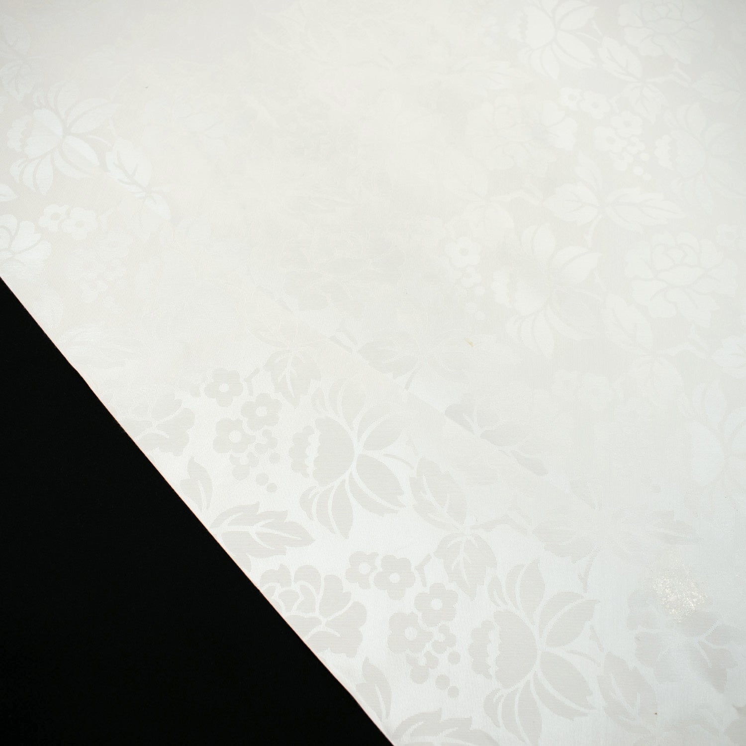 White Floral Tone on Tone Plastic Tablecloth Fabric