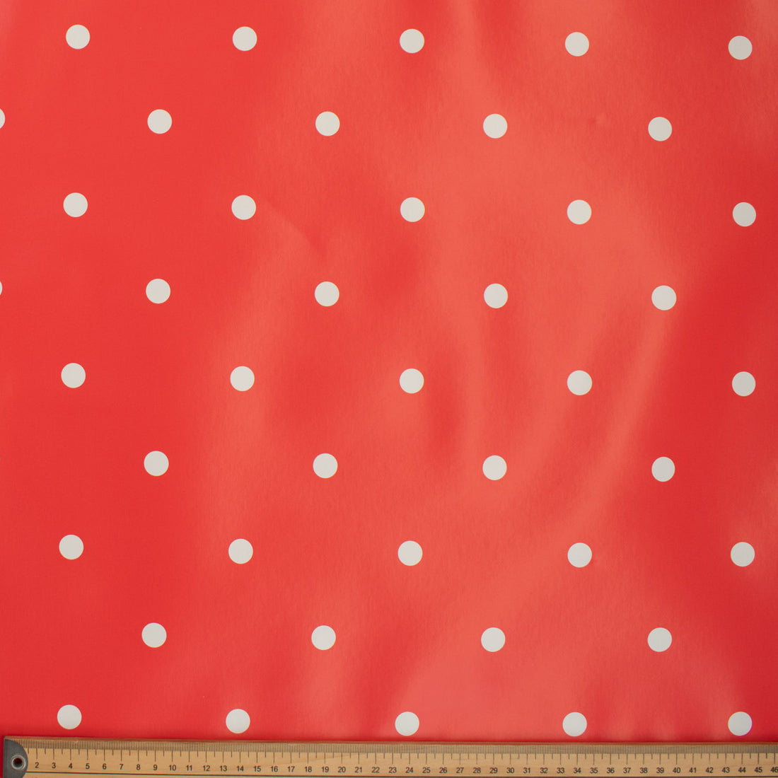 White Dots on Red Plastic Tablecloth Fabric