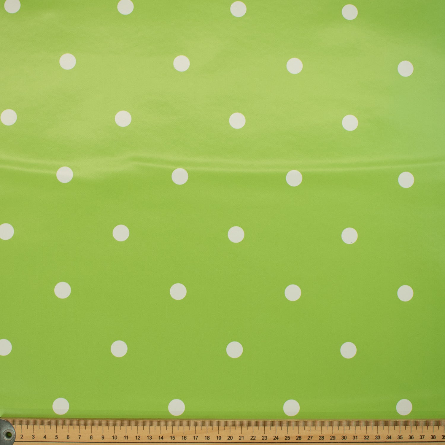 White Dots on Green Plastic Tablecloth Fabric