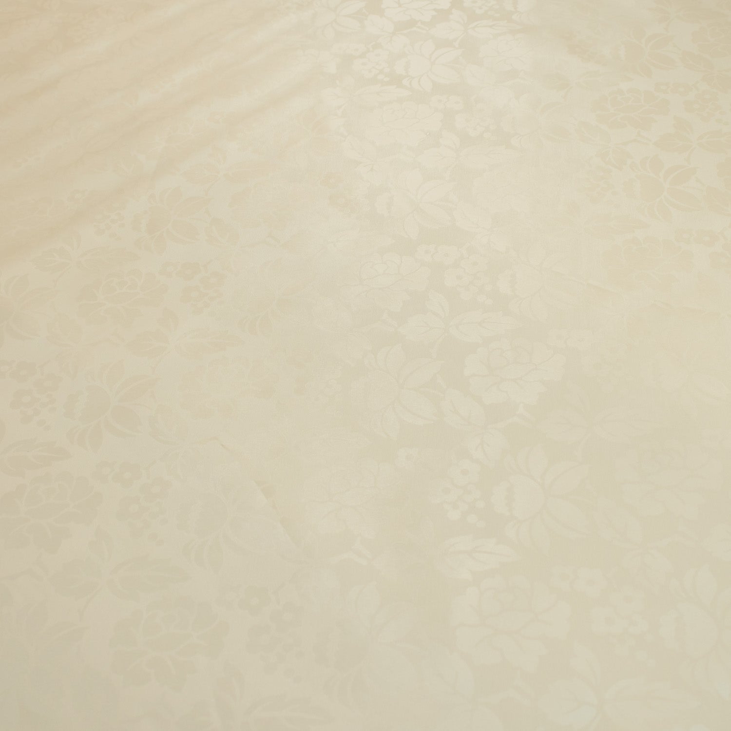 Ivory Flower Tone on Tone Plastic Tablecloth Fabric
