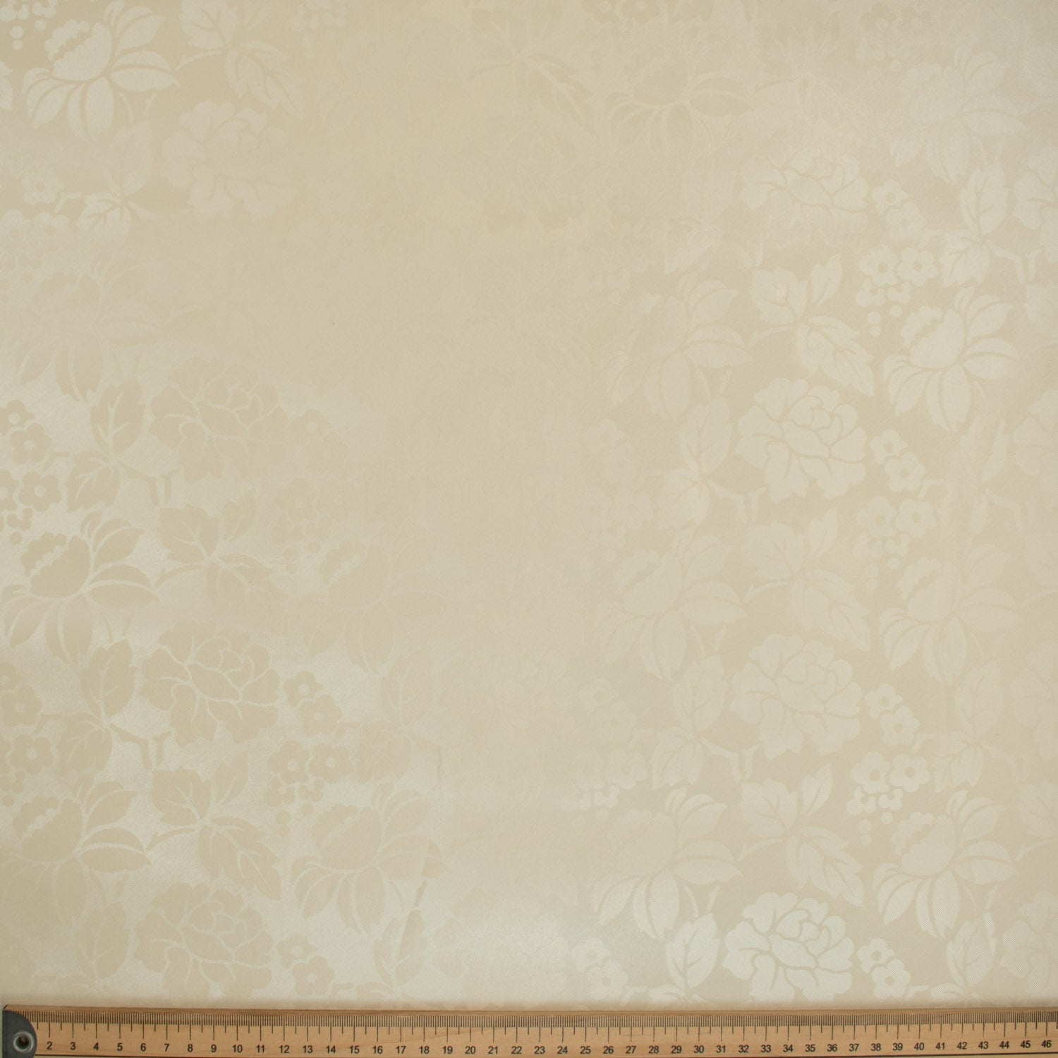 Ivory Flower Tone on Tone Plastic Tablecloth Fabric