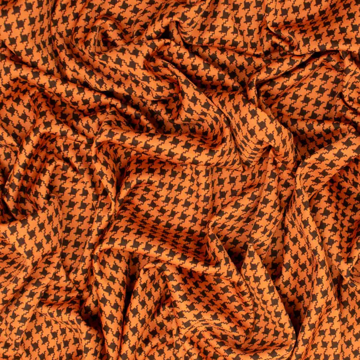 Printed Knits Black Houndstooth on Orange Homecraft Textiles