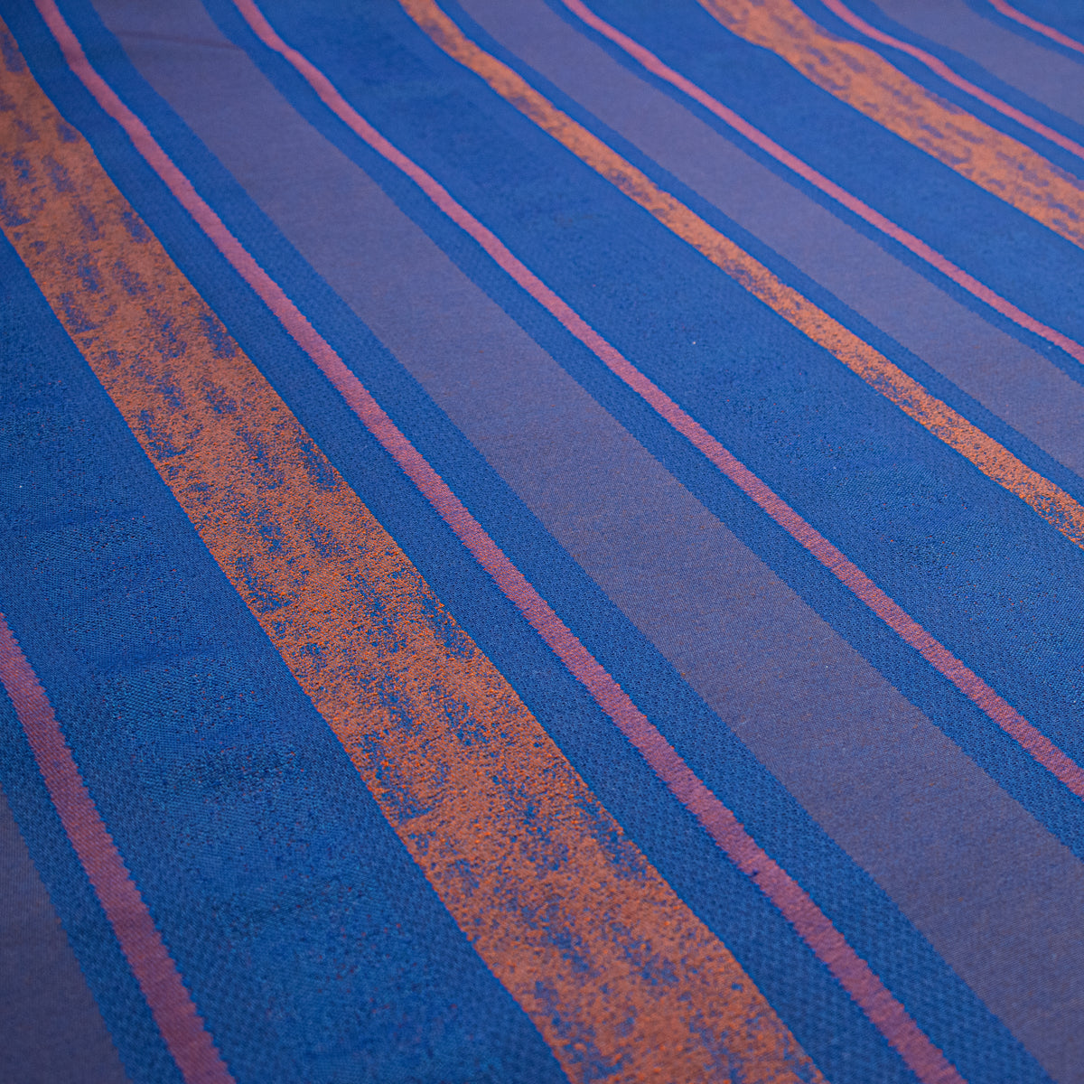Artisan Stripe Woven Upholstery & Suiting Fabric in Rust/Blue