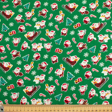 Christmas Cotton Prints Santa, Candy Canes & Snow Flakes on Green